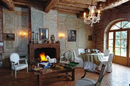 Faded elegance in living room of grand old country villa