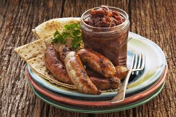 Fried sausages with onion relish