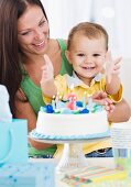 Baby celebrating birthday with mother