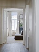 View of sofa from anteroom through open door