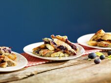 Kaiserschmarren (sweet cut up pancakes) with blueberries