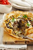 Phyllo tart with beef, zucchini and corn