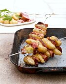 Grilled potato and bacon kebabs
