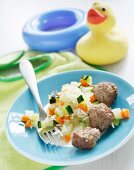 Vegetables and rice with meatballs