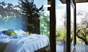 Sleeping area with superb view through wide, double-glazed sliding doors