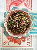 A salad of wild rice, sour cherries, baby spinach and roasted hazelnuts