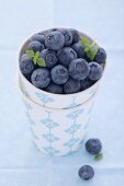 Blueberries in a cardboard cup