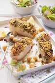 Coalfish fillet with a herb crust and grilled gooseberries