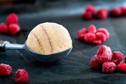 Raspberry ice cream and frozen raspberries
