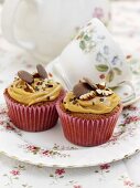 Salted caramel cupcakes with pecan nuts