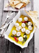Marinated goat's cheese with poppyseed wafers