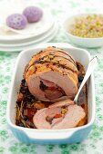 Stuffed roast pork with olives