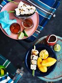 Grilled marshmallow skewers with mango