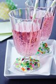 Drinking glasses decorated with confetti