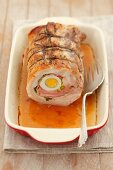 Rolled roast pork filled with egg