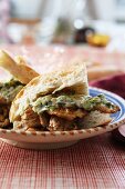 Chicken with a herb sauce in flatbread