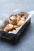 Coconut macaroons in a biscuit tin