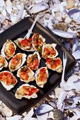 Barbecued oysters with tomatoes