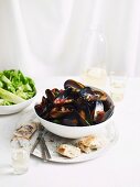 Mussels in red wine with a cucumber and mint salad
