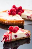 Cheesecake with raspberries and raspberry sauce