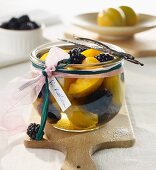 Preserved blackberries and yellow plums