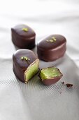Marzipan filled chocolates with pistachios