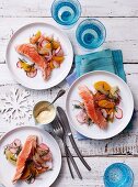 Poached salmon with an orange and radish salad