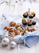 Chocolate mascarpone cream in chocolate bowls and mince pies
