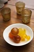 Mostarda di frutta (Italian condiment made of candied fruit and a mustard flavoured syrup) in a bowl