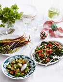 Glazed carrots, Brussels sprouts with bacon, green beans with asparagus, cherry tomatoes and slivered almonds for Christmas