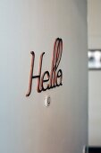 Lettering reading 'Hello' on front door