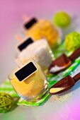 Polenta, rice and pasta in jars with a label and on scoops