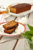 Sweet potato bread with nuts, being drizzled with maple syrup