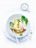 Chicken breast on lemon mashed potatoes with glazed pak choi
