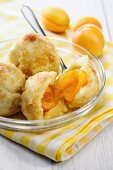 Apricot dumplings with buttery breadcrumb topping and cinnamon sugar