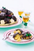 Profiteroles with chocolate sauce for Christmas