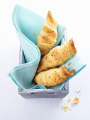 Horn-shaped nut pastries in a napkin