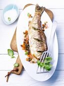 Stuffed salmon trout with lentils