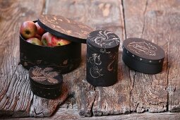 Dark chipwood boxes hand painted with floral motifs