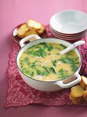 Cream of chicken soup with sweetcorn and baby spinach