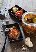 Tomatoes and aubergines preserved in oil