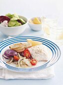 Fillet of fish with fennel, onions and potatoes
