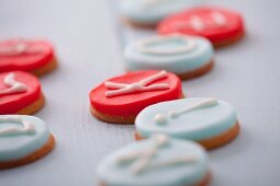 Round marzipan biscuits decorated with letters