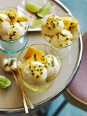 Sundae with mango, pineapple and lime sorbet with passion fruit sauce