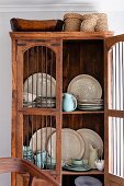 Antique cupboard with lattice doors