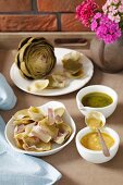 Artichoke leaves with mustard and a herb dip