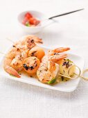Grilled melon and scampi skewers