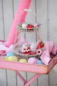 Fruits and cakes hand-crafted from scraps of felt, socks and jersey on wire cake stand