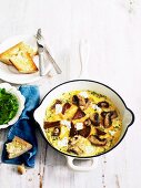 Mushroom omelette with herbs and chunks of baguette