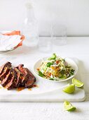 Grilled beef skirt steak with coleslaw (Asia)